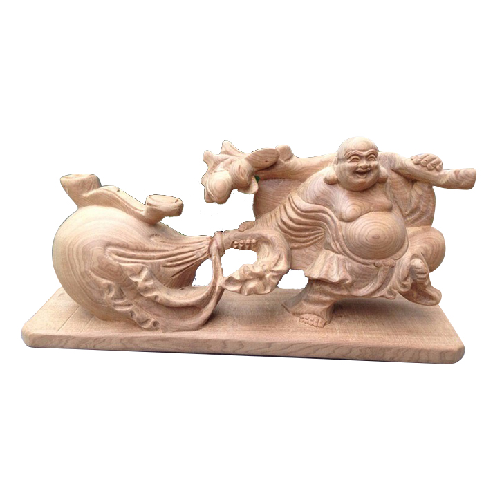 Để tạo nên một pho tượng Di Lặc kéo bao tiền hoàn chỉnh, người nghệ nhân đá mỹ nghệ phải kết hợp hài hòa giữa kỹ thuật và cảm xúc